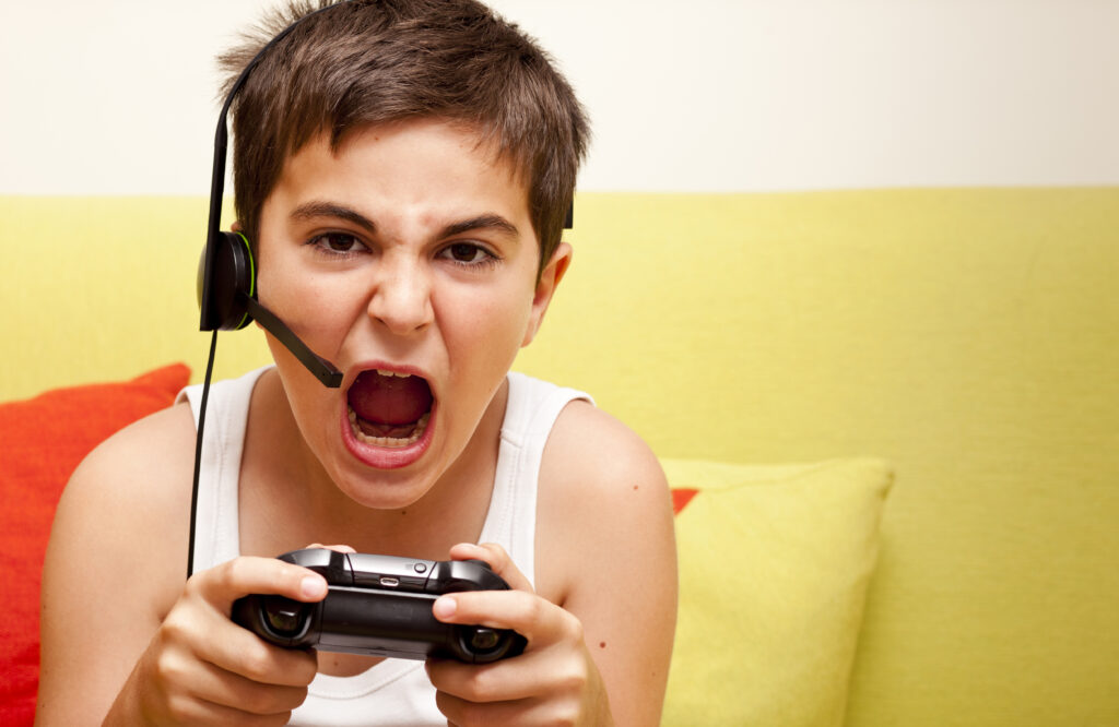 Little boy playing video games